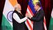 भारतीय प्रधानमंत्री नरेंद्र मोदी और मलेशियाई प्रधानमंत्री अनवर इब्राहिम हाथ मिलाते हुए भारतीय प्रधानमंत्री नरेंद्र मोदी और मलेशियाई प्रधानमंत्री अनवर इब्राहिम हाथ मिलाते हुए