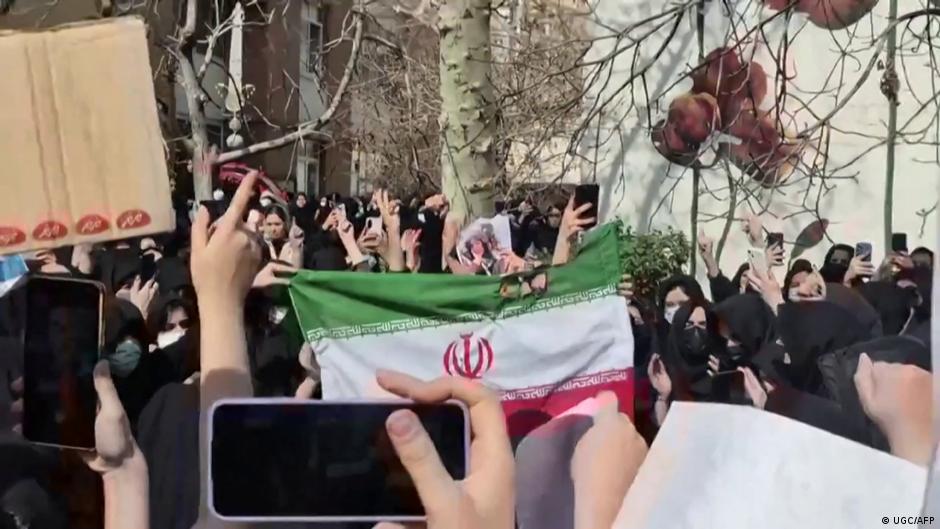Iranians caught between anger, fear and desire for change