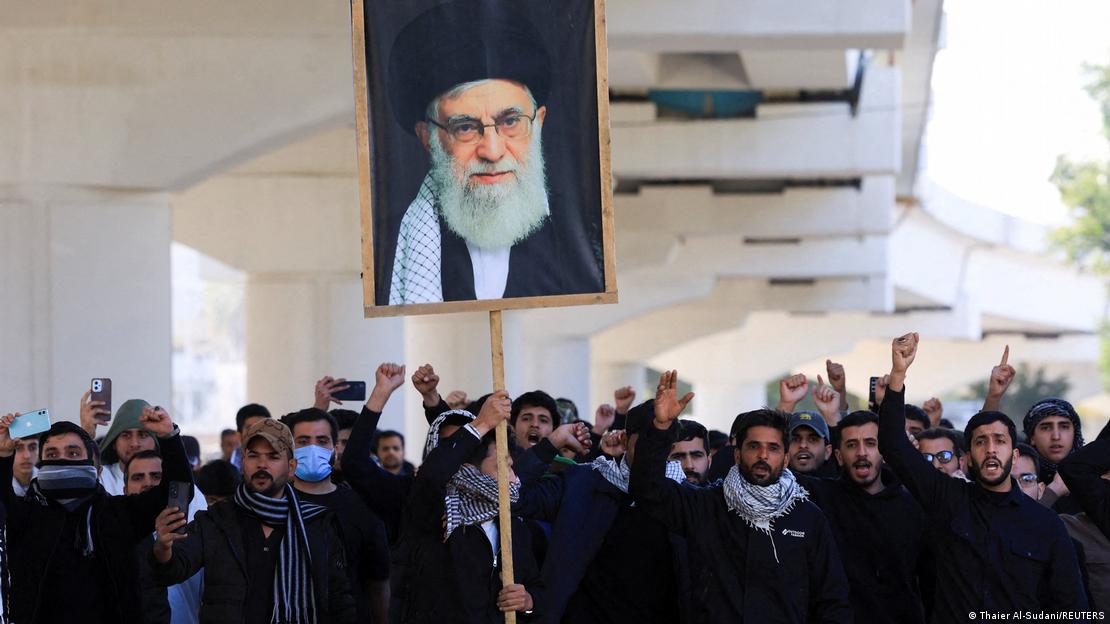 Protesters supporting Iraqi Shiite armed groups demonstrate near the entrance of the Green Zone after the killing of Iran's Supreme Leader Ayatollah Ali Khamenei