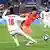 Choe Yuri of South Korea kicks the ball for a goal