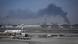 Dubai airport with smoke in the sky in a photo from 01.03.2026. Dubai airport with smoke in the sky in a photo from 01.03.2026.