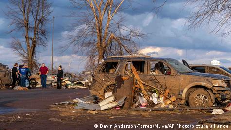 Debris piled up on a car after a tornado ripped through Three Rivers, Michigan, USA Debris piled up on a car after a tornado ripped through Three Rivers, Michigan, USA