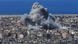 Humo gris se eleva al cielo mientras Israel bombardea la periferia sur de Beirut. Humo gris se eleva al cielo mientras Israel bombardea la periferia sur de Beirut.