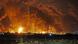 Humo negro y espeso se eleva desde depósitos de petróleo tras ataques aéreos de Israel y Estados Unidos, al noroeste de Teherán, Irán, el 8 de marzo de 2026. Humo negro y espeso se eleva desde depósitos de petróleo tras ataques aéreos de Israel y Estados Unidos, al noroeste de Teherán, Irán, el 8 de marzo de 2026.