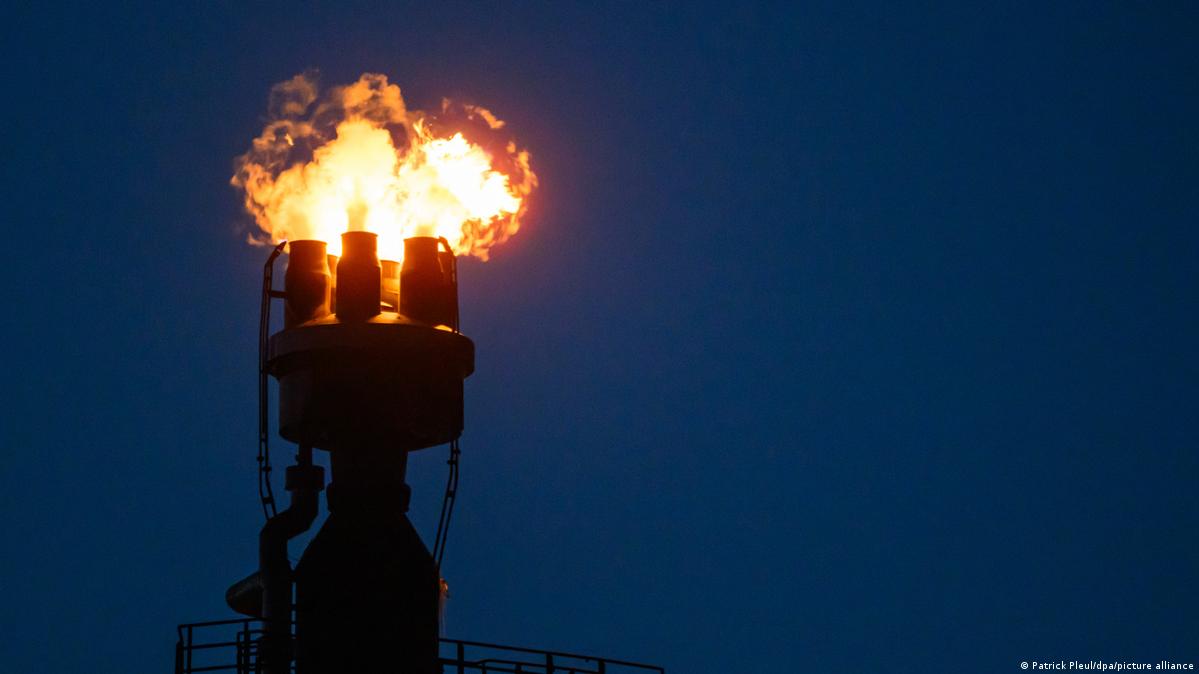 A big red flame can be seen as excess gas is burned off at a German refinery