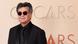 Jafar Panahi mit Sonnenbrille und dunklem Anzug vor "Oscars"-Schriftzügen Jafar Panahi mit Sonnenbrille und dunklem Anzug vor "Oscars"-Schriftzügen