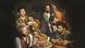 promotional picture of the band Sistanagila, musicians around a festive table of food. promotional picture of the band Sistanagila, musicians around a festive table of food.