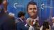 A large photo of Charlie Kirk at a Turning Point USA convention A large photo of Charlie Kirk at a Turning Point USA convention