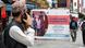 A man looks at a large poster urging people to participate in the Indian census (April 2026) A man looks at a large poster urging people to participate in the Indian census (April 2026)