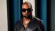 West is seen wearing large sunglasses and a metal chain in this file photo dated February 20, 2020 West is seen wearing large sunglasses and a metal chain in this file photo dated February 20, 2020