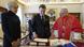 Emmanuel Macron and Brigitte Macron stand next to Pope Leo XIV 