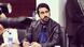اشکان نظام‌آبادی، روزنامه‌نگار اقتصادی 