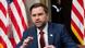 Vice President JD Vance speaks into a microphone flanked by US flags in the White House complex, March 27, 2026. Vice President JD Vance speaks into a microphone flanked by US flags in the White House complex, March 27, 2026.