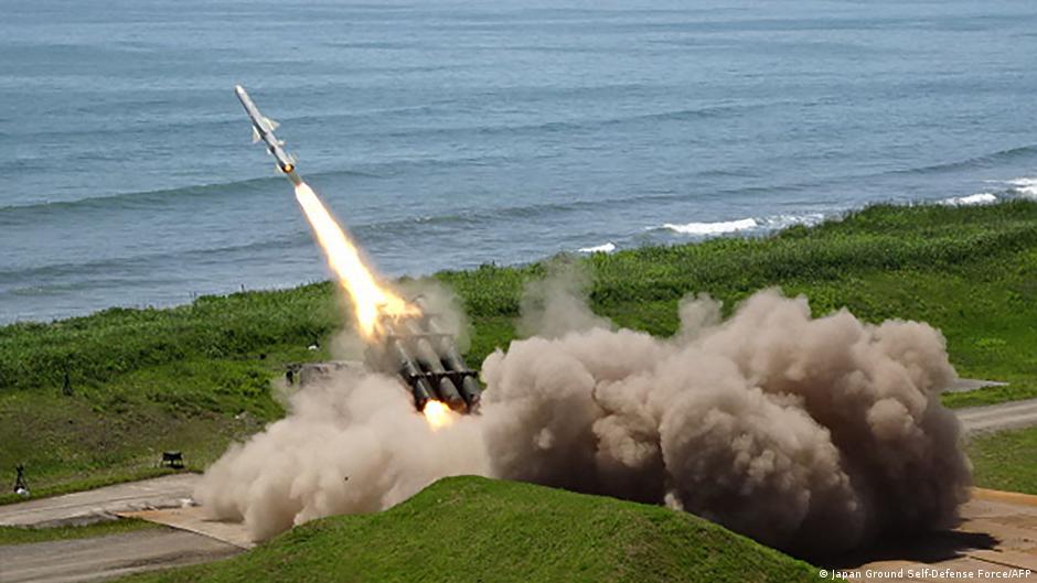 Japan loosens long-standing curbs on arms exports