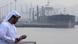 An Emirati man stands next to the oil terminal in Fujairah, United Arab Emirates, on September 21, 2016 An Emirati man stands next to the oil terminal in Fujairah, United Arab Emirates, on September 21, 2016
