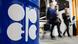 Symbolbild OPEC | Menschen vor einer Installation mit OPEC-Logo Symbolbild OPEC | Menschen vor einer Installation mit OPEC-Logo