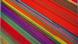 Líneas de tulipanes de diferentes colores intensos, vistos desde las alturas. Líneas de tulipanes de diferentes colores intensos, vistos desde las alturas.