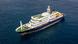 This aerial picture shows a general view of the cruise ship MV Hondius stationary off the port of Praia, the capital of Cape Verde, on May 3, 2025 This aerial picture shows a general view of the cruise ship MV Hondius stationary off the port of Praia, the capital of Cape Verde, on May 3, 2025