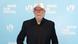 Rolando Díaz, director de "Adiós Cuba", vestidod e negro y con gorra blanca.