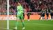 Manuel Neuer looks sadly at his goal net as PSG players celebrate in the background Manuel Neuer looks sadly at his goal net as PSG players celebrate in the background
