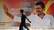 A man walks past a poster of Vijay in Chennai A man walks past a poster of Vijay in Chennai