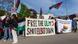 Protesters holding up a banner reading 'free the Ulm 5' Protesters holding up a banner reading 'free the Ulm 5'