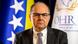 A man (Christian Schmidt) looks into the camera. Behind him are the flags of Bosnia and Herzegovina and a flag bearing the logo of the Office of the High Representative, Sarajevo, Bosnia and Herzegovina, October 10, 2023 A man (Christian Schmidt) looks into the camera. Behind him are the flags of Bosnia and Herzegovina and a flag bearing the logo of the Office of the High Representative, Sarajevo, Bosnia and Herzegovina, October 10, 2023