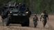 US Army soldiers walk in formation during the Sword 26 exercise, approaching a MEDEVAC vehicle as NATO forces demonstrate innovation in battlefield casualty evacuation using drones and medical tech in Bemowo Piskie, Poland, May 11, 2026 US Army soldiers walk in formation during the Sword 26 exercise, approaching a MEDEVAC vehicle as NATO forces demonstrate innovation in battlefield casualty evacuation using drones and medical tech in Bemowo Piskie, Poland, May 11, 2026