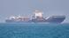 Container ships sit at anchor in the Strait of Hormuz off Bandar Abbas, Iran, Saturday, May 2, 2026 Container ships sit at anchor in the Strait of Hormuz off Bandar Abbas, Iran, Saturday, May 2, 2026