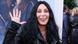 Cher waving and smiling. Cher waving and smiling.