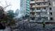 Rescue workers climb on rubble of an apartment in Kyiv Rescue workers climb on rubble of an apartment in Kyiv