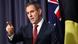 Treasurer Jim Chalmers points his finger as he stands in front of an Australian flag Treasurer Jim Chalmers points his finger as he stands in front of an Australian flag