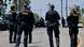  Group of police seen from the back