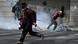 A demonstrator runs as protesters clash with law enforcement in La Paz, Bolivia A demonstrator runs as protesters clash with law enforcement in La Paz, Bolivia