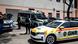 A vehicle of the National Gendarmerie of Portugal in the foreground, police and camerapersons in the background A vehicle of the National Gendarmerie of Portugal in the foreground, police and camerapersons in the background