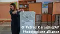 Cyprus votes amid resentment over corruption, living costs