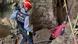 Rescuers at the entrance to a cave Rescuers at the entrance to a cave