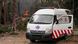 Libanon Kfar Roummane 2026 | Ein Krankenwagen steht vor Bäumen, im Hintergrund sind Flammen zu sehen Libanon Kfar Roummane 2026 | Ein Krankenwagen steht vor Bäumen, im Hintergrund sind Flammen zu sehen