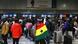 A man draped in a Ghana flag stands in a crowd at O.R. Tambo International Airport in Kempton Park, South Africa, May 27, 2026. A man draped in a Ghana flag stands in a crowd at O.R. Tambo International Airport in Kempton Park, South Africa, May 27, 2026.