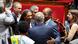 (From L) Libertes, Independants, Outre-Mer et Territoires' MP Christophe Naegelen, Ecologiste et Social's MP Steevy Gustave, Socialistes et Apparentes' MP Elie Califer cheer after a proposed bill aimed at abolishing the slavery-related laws passed unanimously at The National Assembly, France's lower house parliament, in Paris on May 28, 2026. (From L) Libertes, Independants, Outre-Mer et Territoires' MP Christophe Naegelen, Ecologiste et Social's MP Steevy Gustave, Socialistes et Apparentes' MP Elie Califer cheer after a proposed bill aimed at abolishing the slavery-related laws passed unanimously at The National Assembly, France's lower house parliament, in Paris on May 28, 2026.
