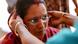 A woman in India is fitted with a new pair of glasses: Weaver Savita Maharana tries on the glasses during the "GoodVision" screening A woman in India is fitted with a new pair of glasses: Weaver Savita Maharana tries on the glasses during the "GoodVision" screening