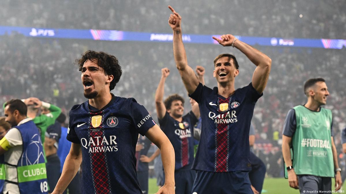 Paris St Germain's Vitinha, Fabian Ruiz and Joao Neves celebrate after winning the UEFA Champions League