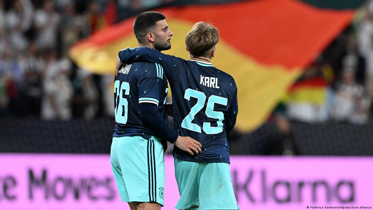 Deniz Undav and Lennart Karl celebrate the third goal