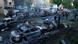 People look at cars damaged during Russian missile and drone strikes, at a garage, amid Russia's attack on Ukraine People look at cars damaged during Russian missile and drone strikes, at a garage, amid Russia's attack on Ukraine