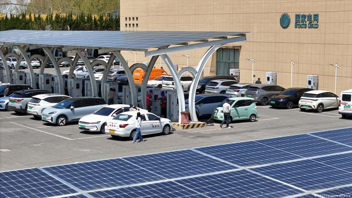 Electric vehicles charging at a charging station in Shandong