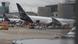 A Lufthansa aircraft angled downwards on the tarmac A Lufthansa aircraft angled downwards on the tarmac