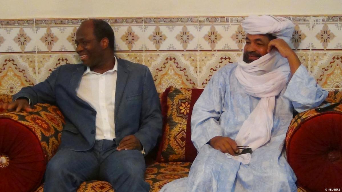 Iyad Ag Ghaly (right), the alleged leader of Ansar Dine, an al Qaeda-linked Islamist group in northern Mali, meets with Burkina Faso's then foreign minister, Djibril Bassol