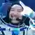 Luca Parmitano, an ESA astronaut from Italy seen smiling in his spacesuit