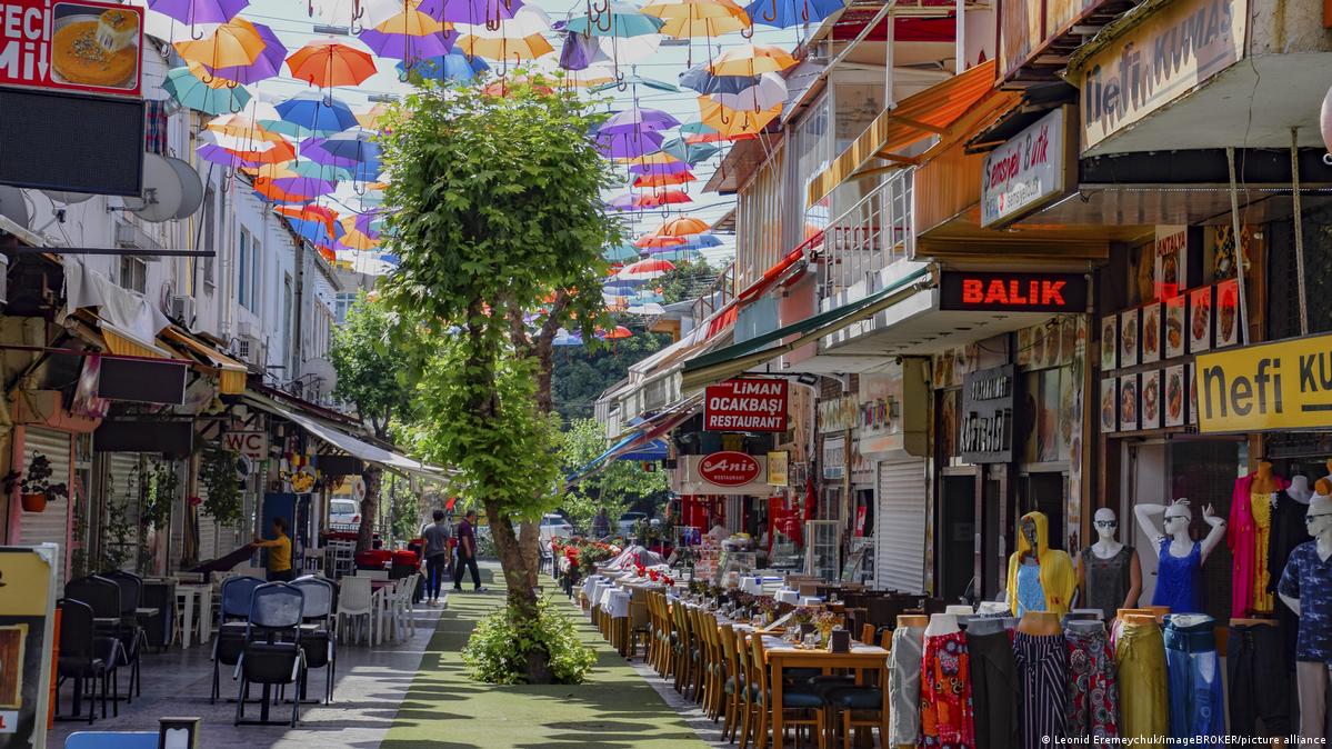 Rows of hanging umbrellas over a street in the Old Town of Antalya