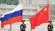 Прапори Росії і Китаю з нагоди візиту російського президента Володимира Путіна у Пекін Прапори Росії і Китаю з нагоди візиту російського президента Володимира Путіна у Пекін